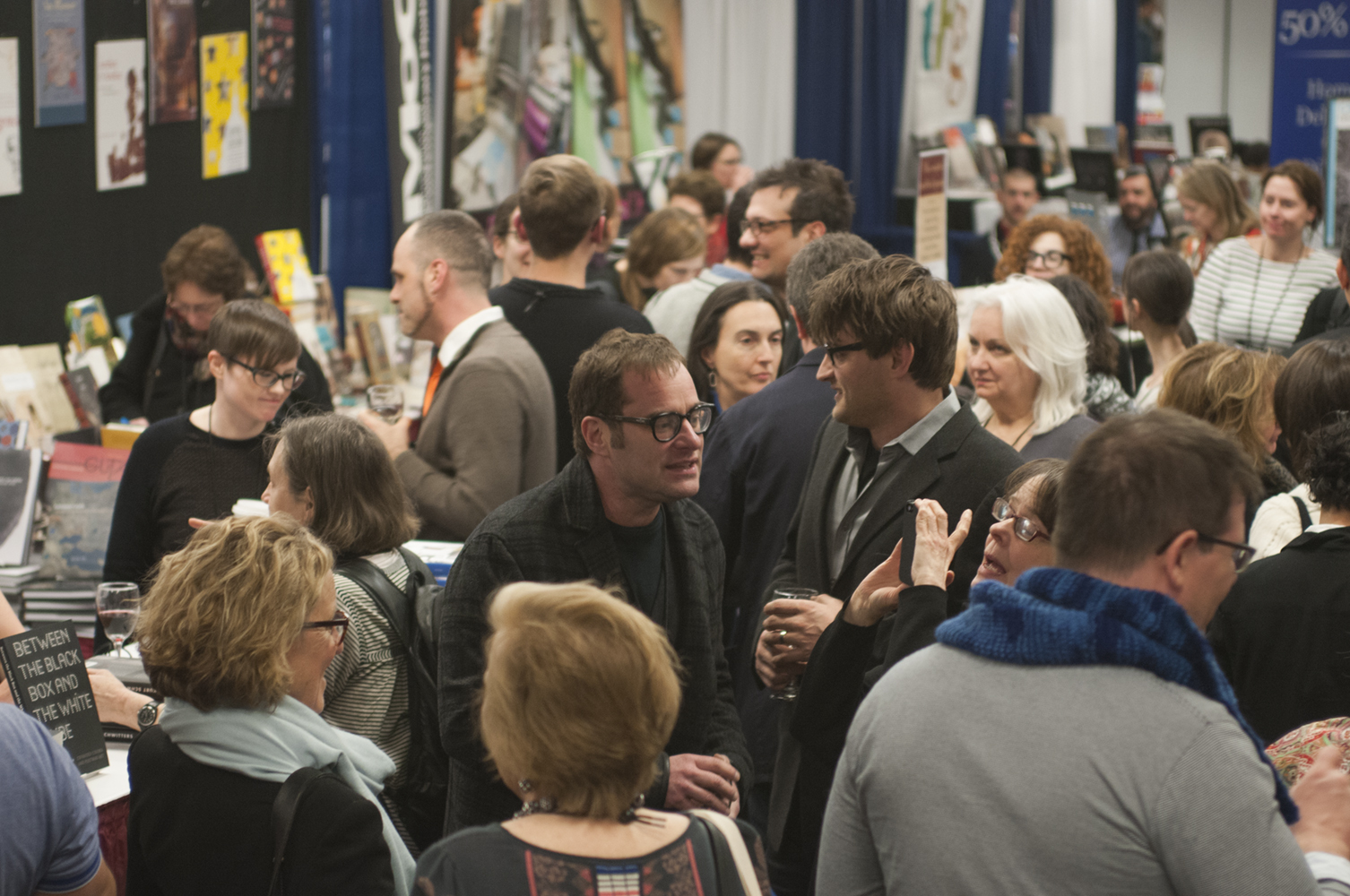 a crowded aisle of the 2014 book and trade fair